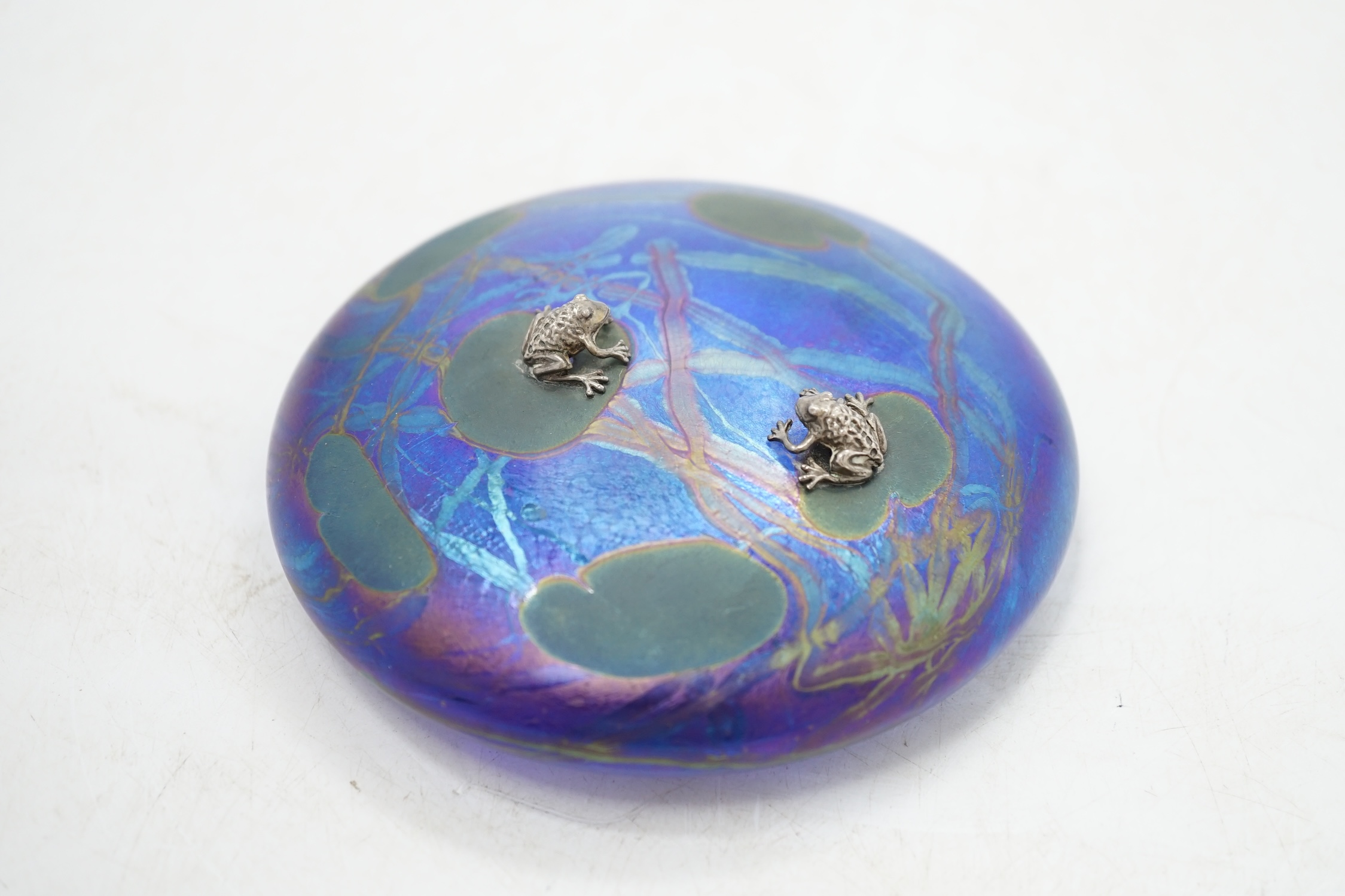 A John Ditchfield for Glasform disc shaped paperweight with two mounted silver frogs on a lily pad, 10cm diameter. Condition - good